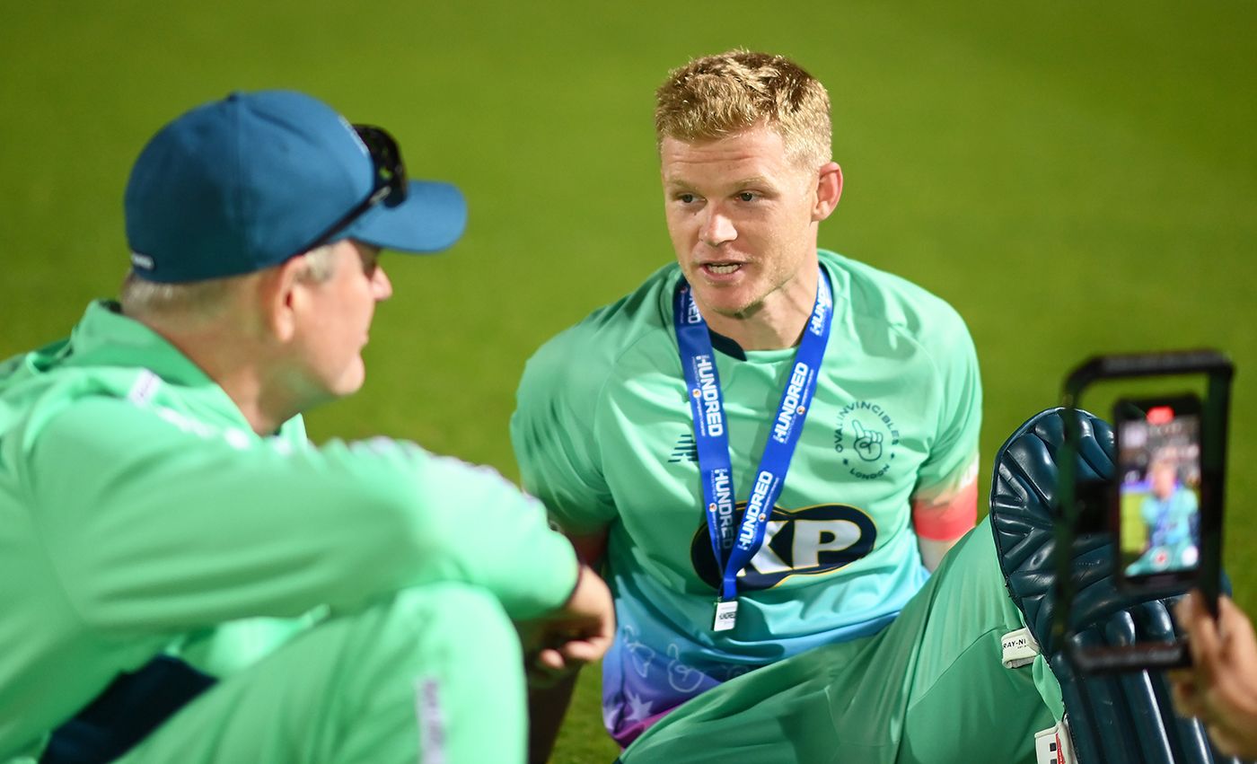 Sam Billings chats with Tom Moody on the outfield