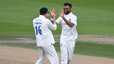 Hutton grit helps bail out champions at Hove