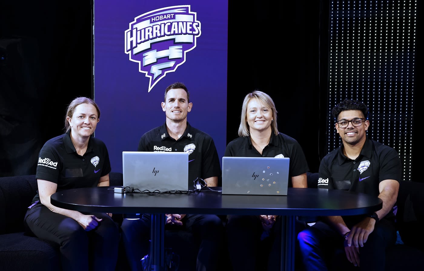 Head coach Jude Coleman, Graeme Beghin, Salliann Beams and Clive Rose at the Hurricanes table