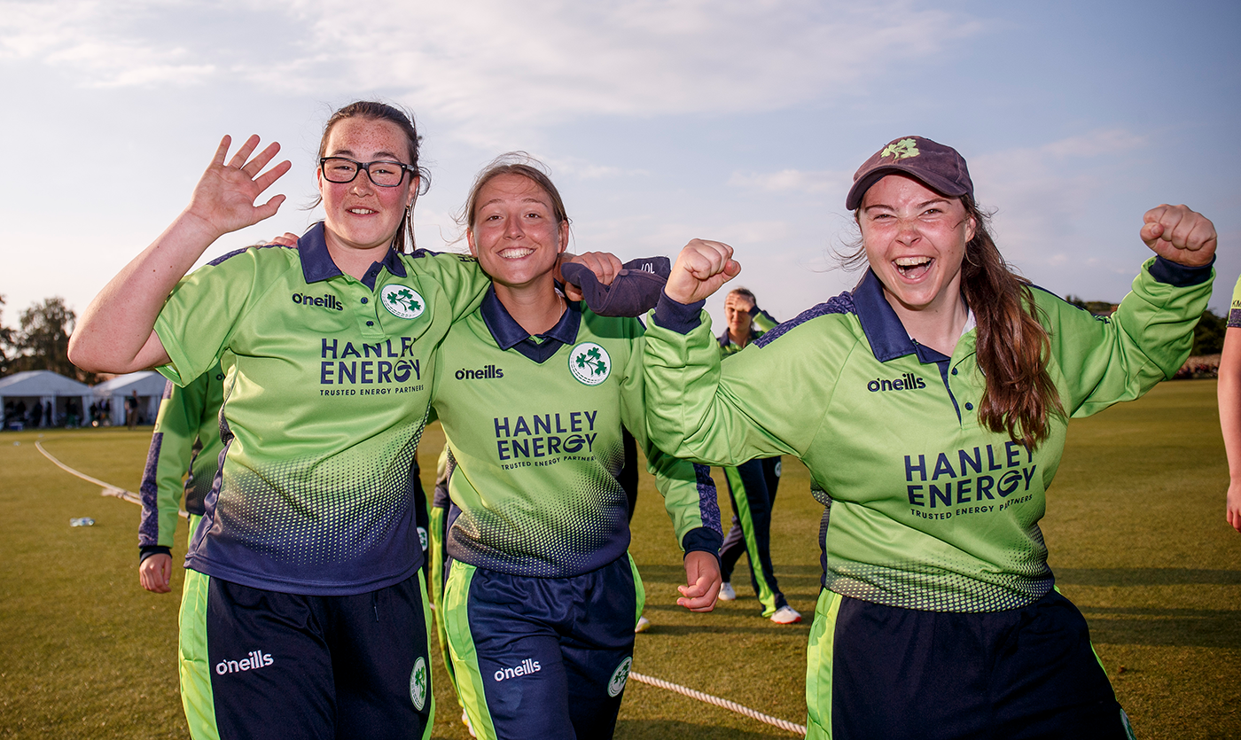 Jane Maguire, Sarah Forbes and Cara Murray celebrate Ireland's win over South Africa