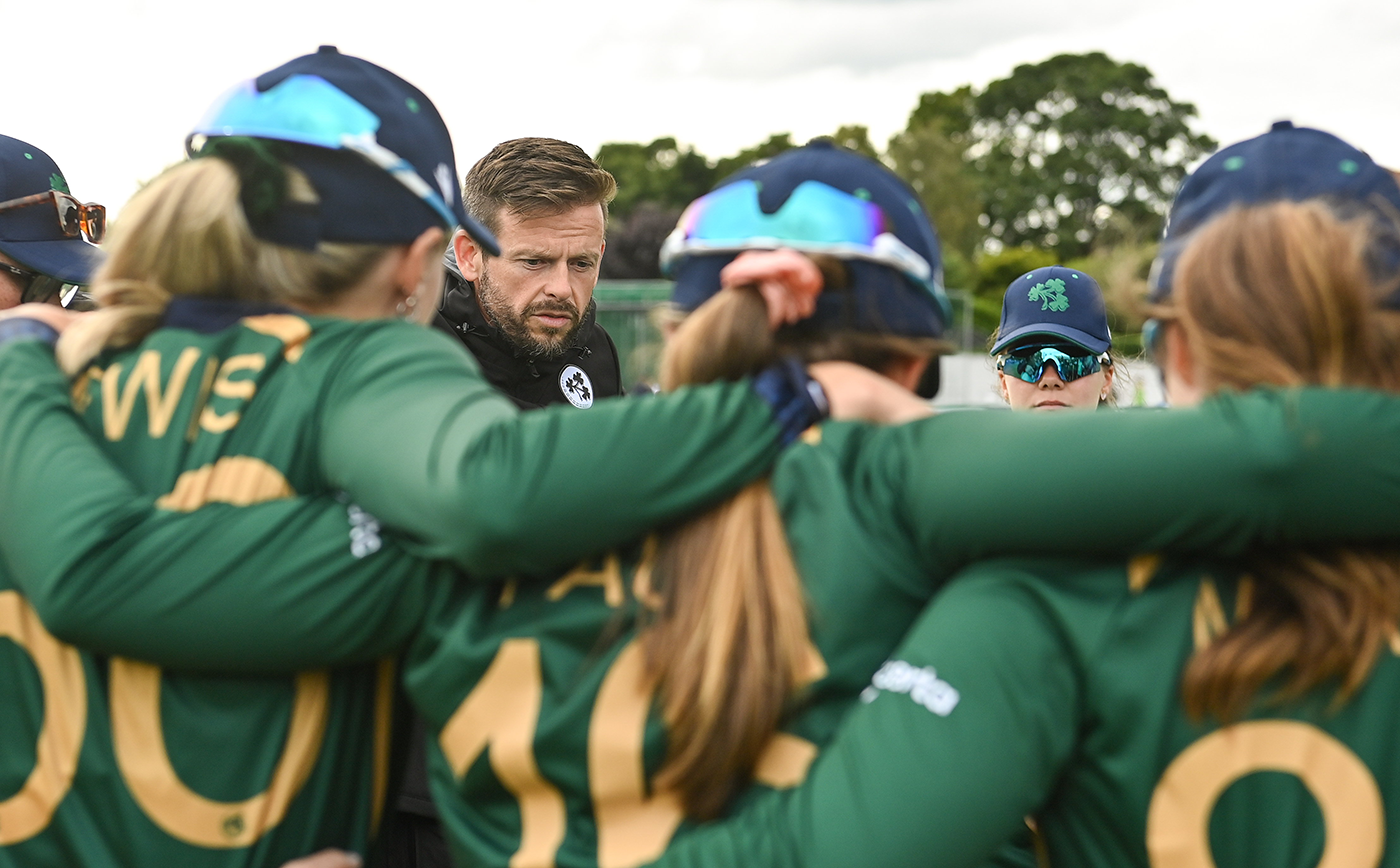 Coach Ed Joyce in a huddle with Ireland players