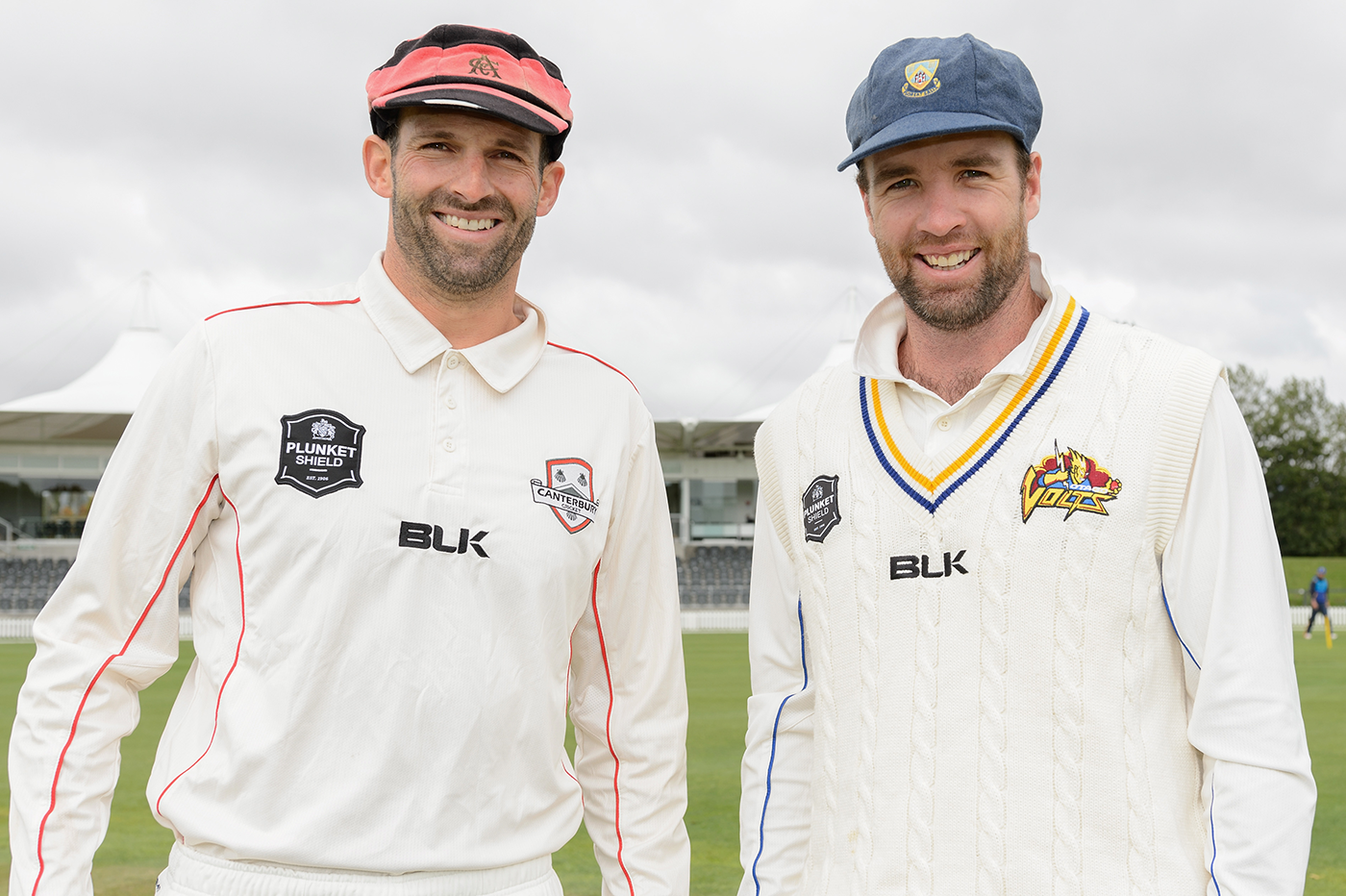 Captains Andrew Ellis and Brad Wilson pose for photos ahead of the match