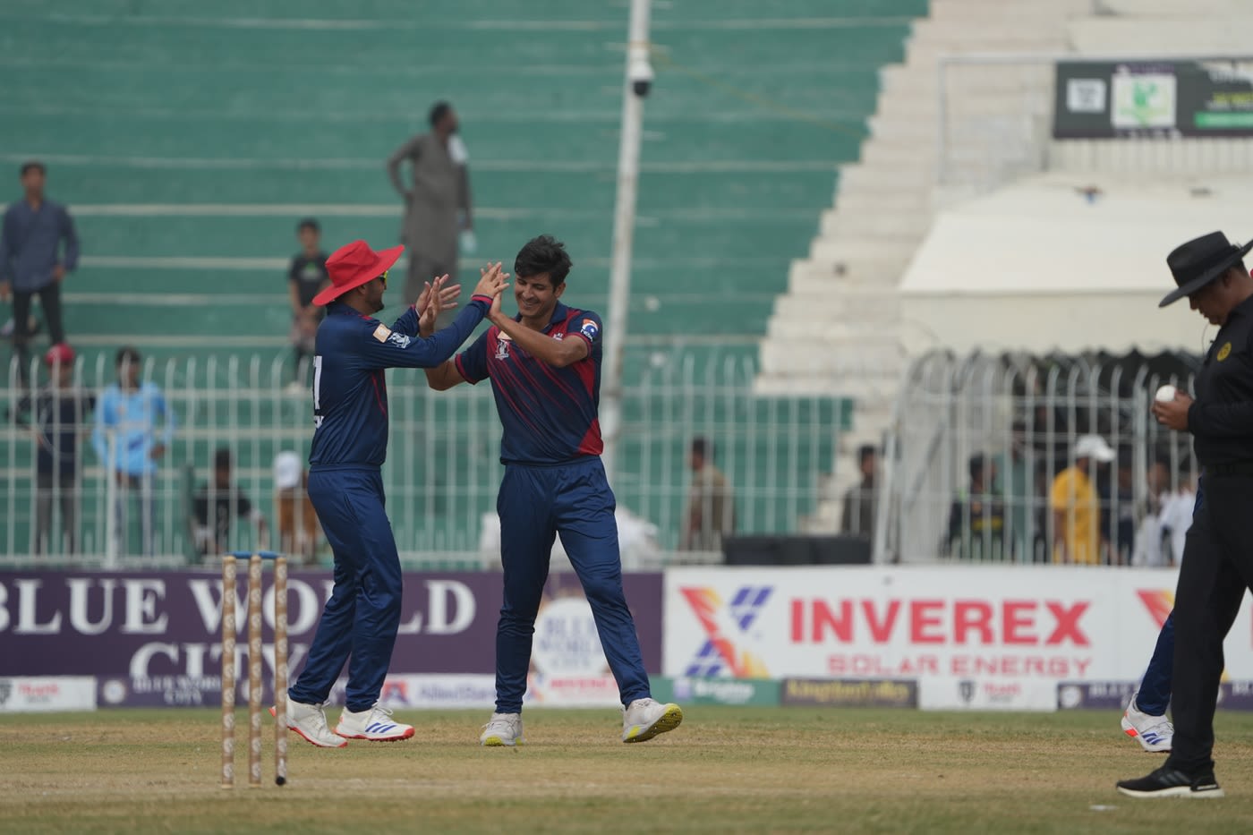 Mir Hamza celebrates an early wicket