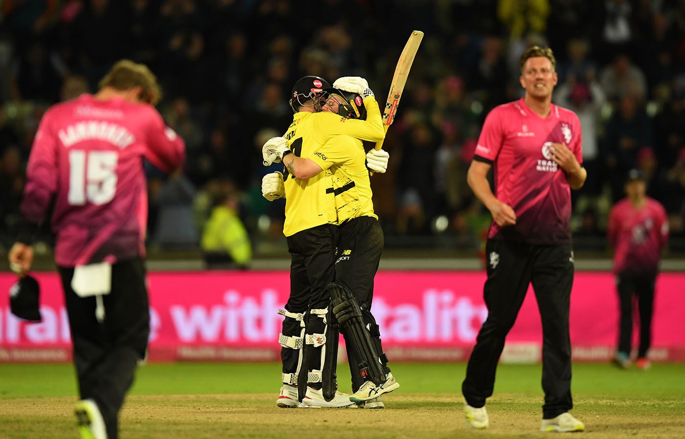 Oliver Price and Miles Hammond embrace after winning the Blast Final