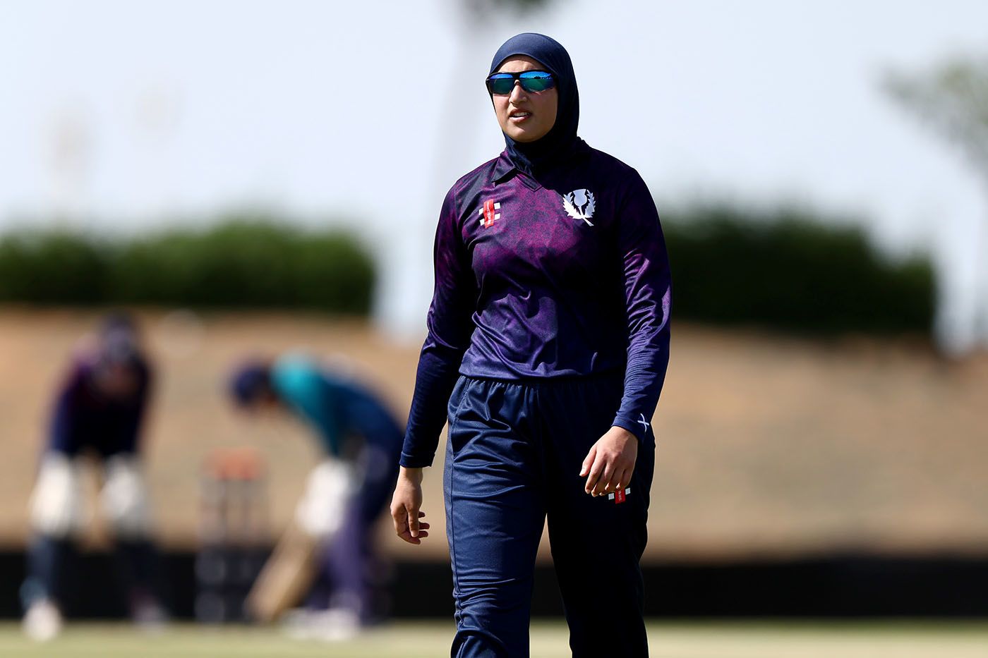 Abtaha Maqsood looks on from the field