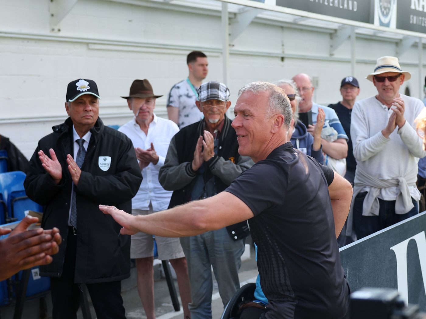Alec Stewart celebrates with Surrey fans after their victory over Durham