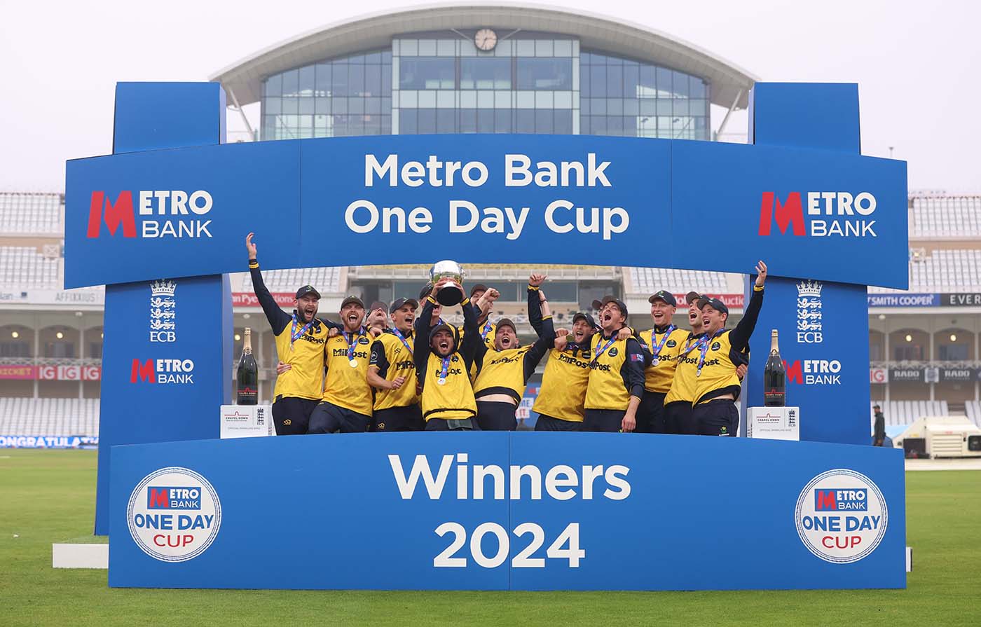 Kiran Carlson raises the Metro Bank One-Day Cup