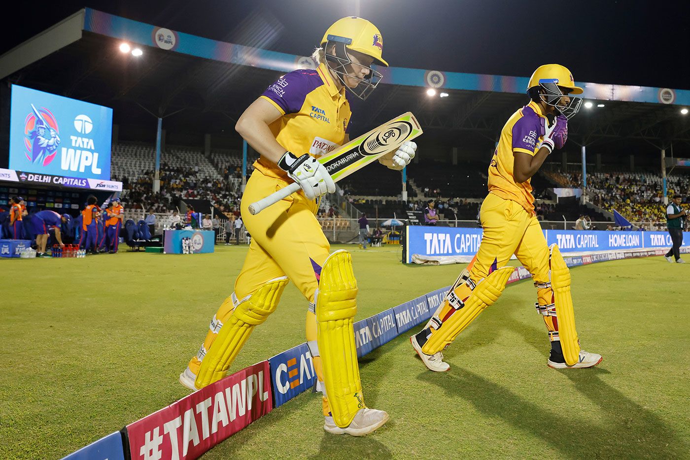 Alyssa Healy and Shweta Sehrawat walk out to bat