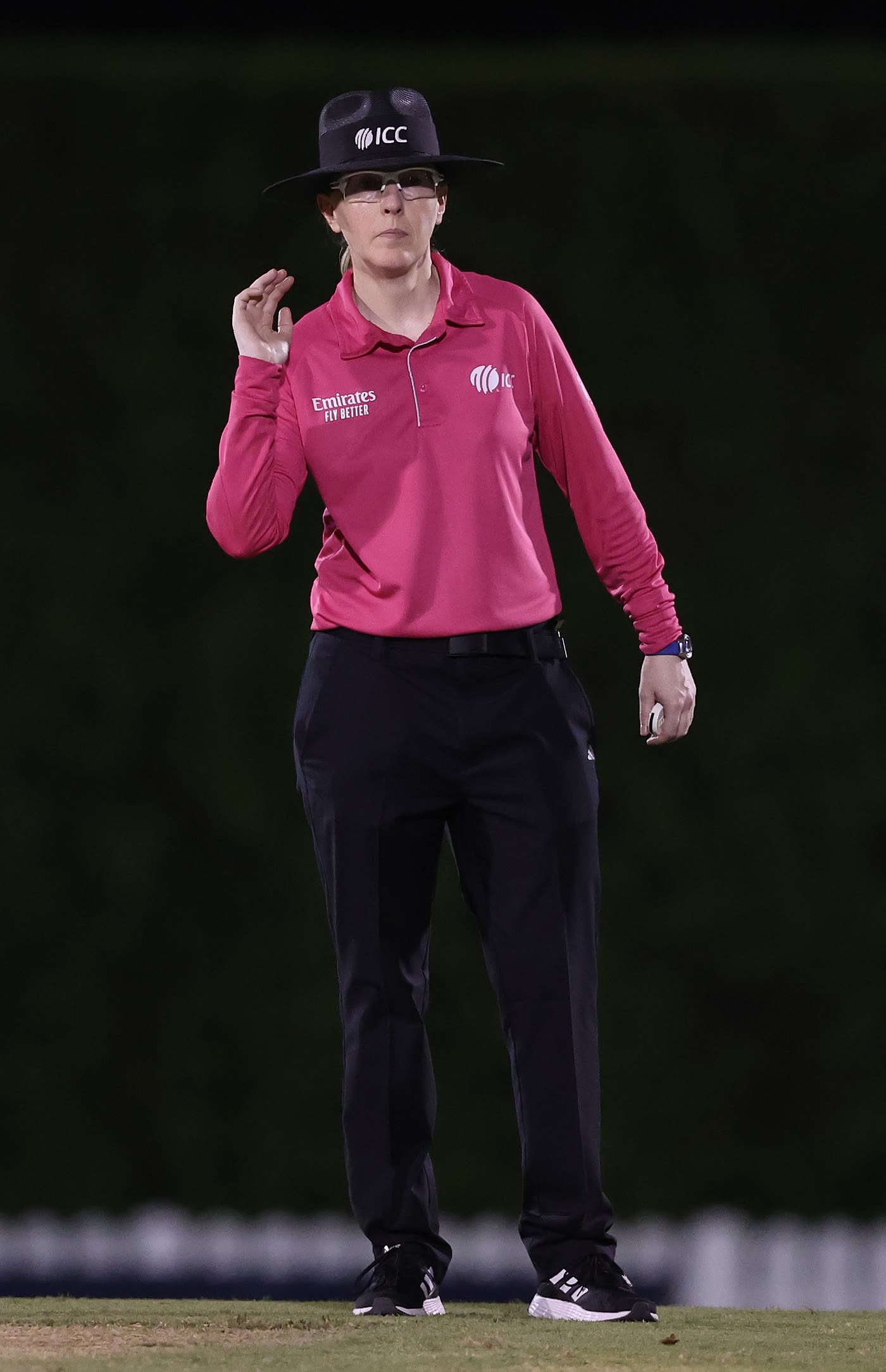 Kim Cotton officiates in a warm-up game