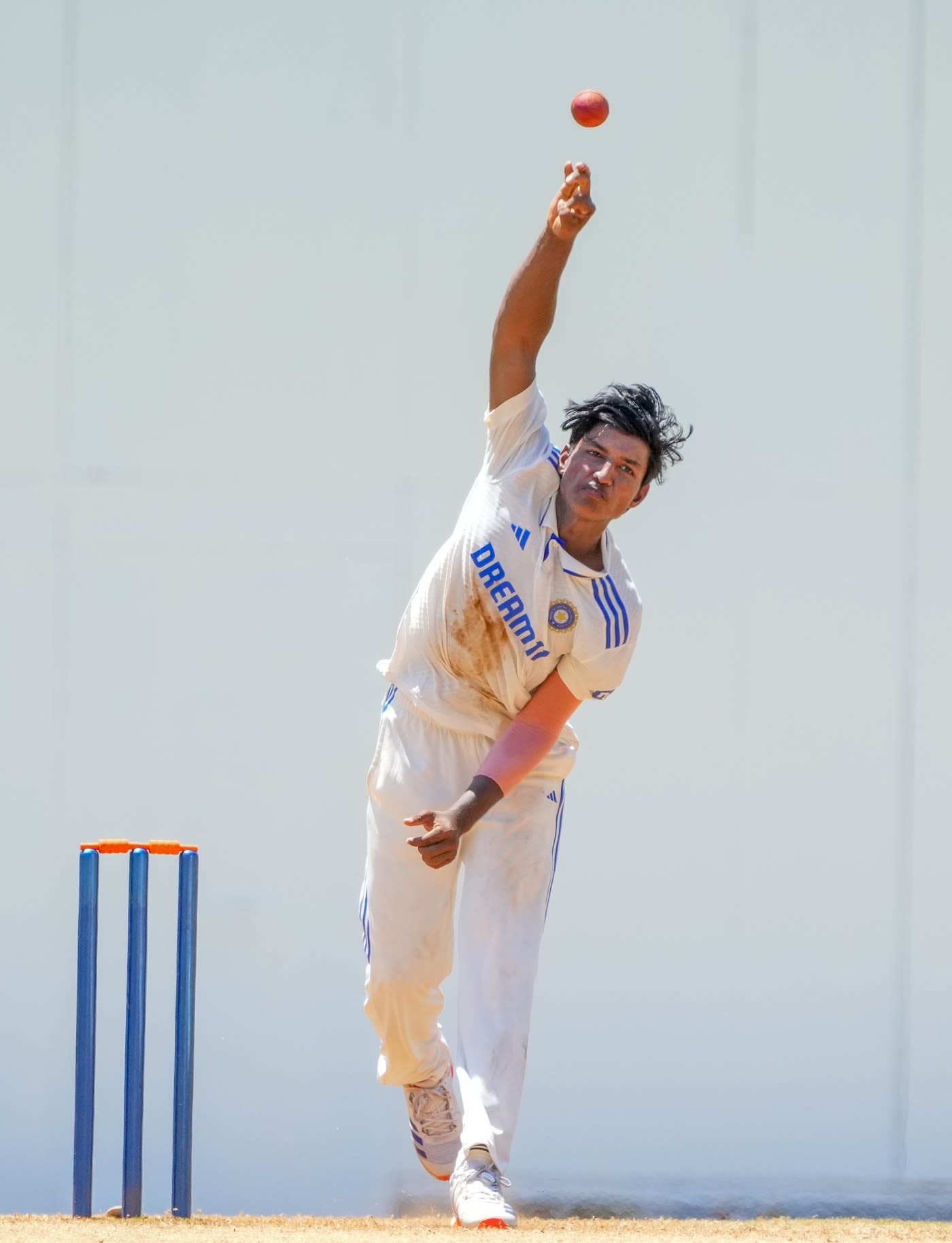 Mohamed Enaan tosses one up