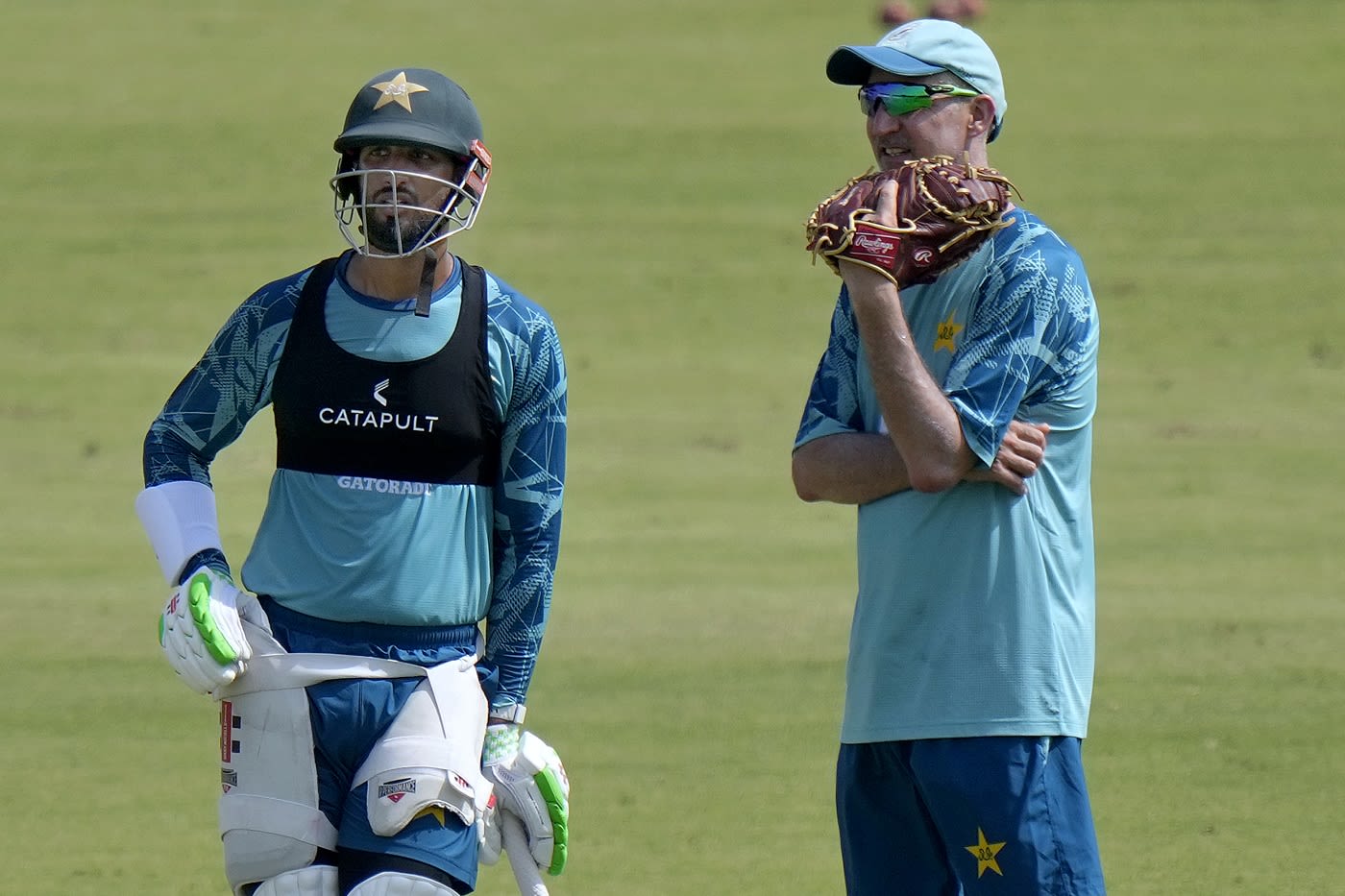 Pakistan captain Shan Masood has a chat with coach Jason Gillespie