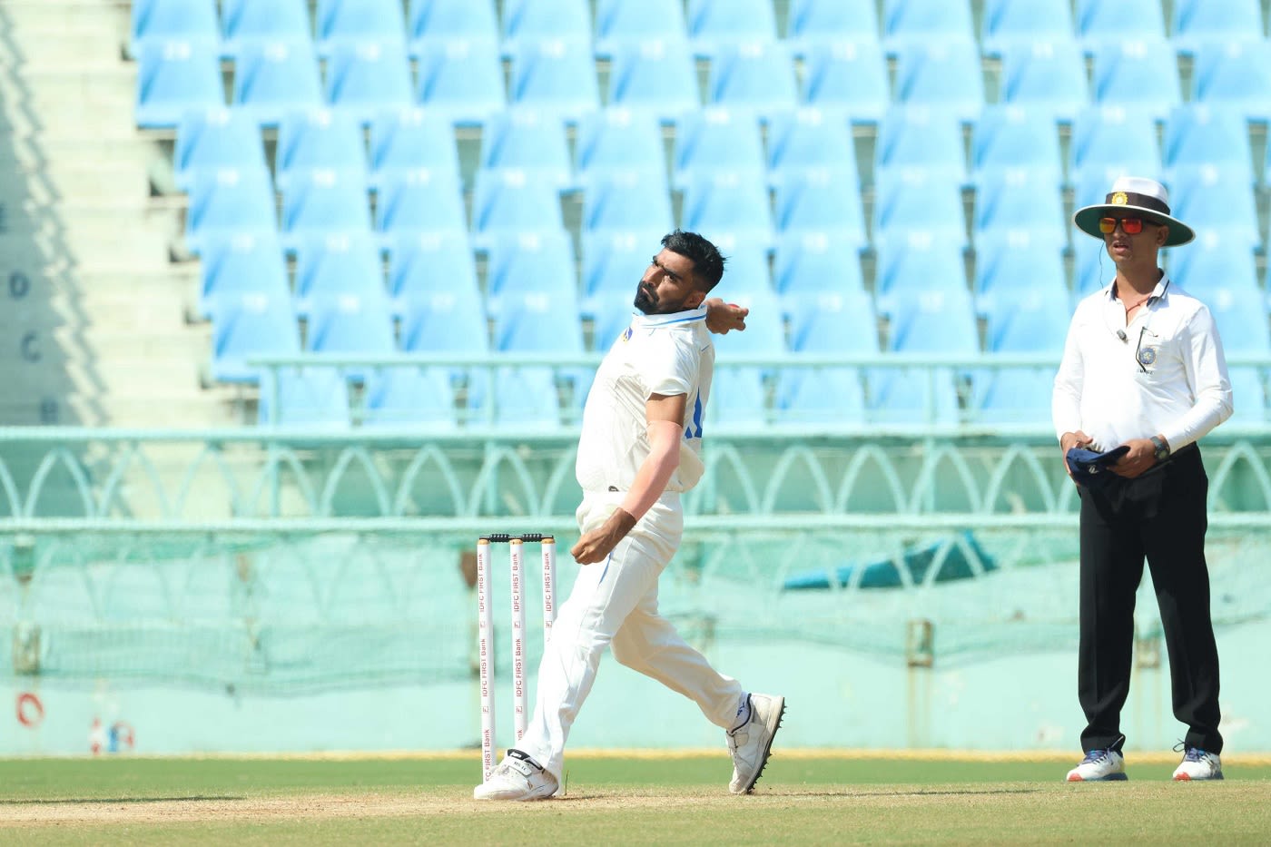 Mohammed Kaif bends his back
