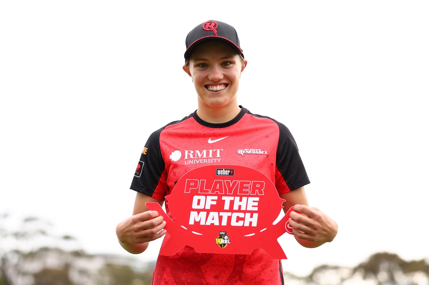 Charis Bekker poses with her player-of-the-match trophy