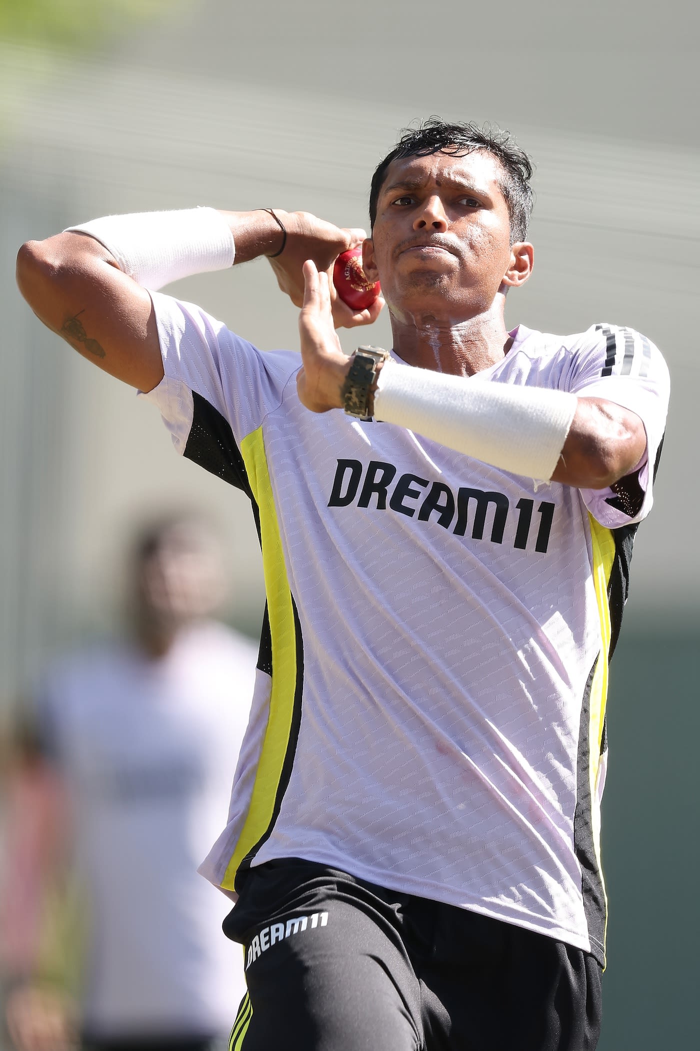 Navdeep Saini has a bowl in the nets