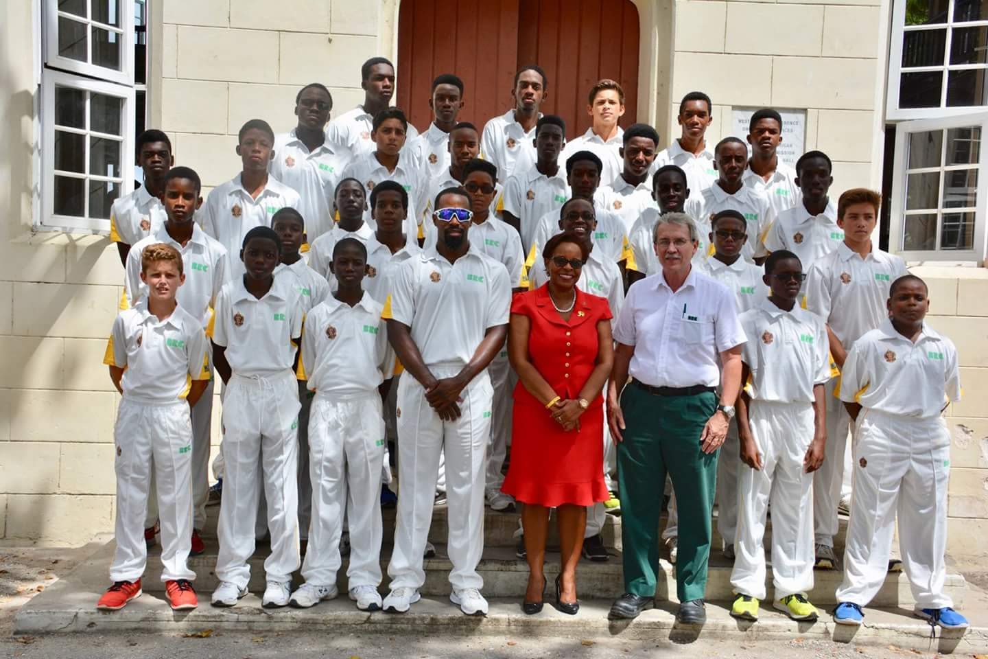 Harrison College cricket team, circa 2016, featuring Jacob Bethell (front left) and coach Corey Edwards (centre)