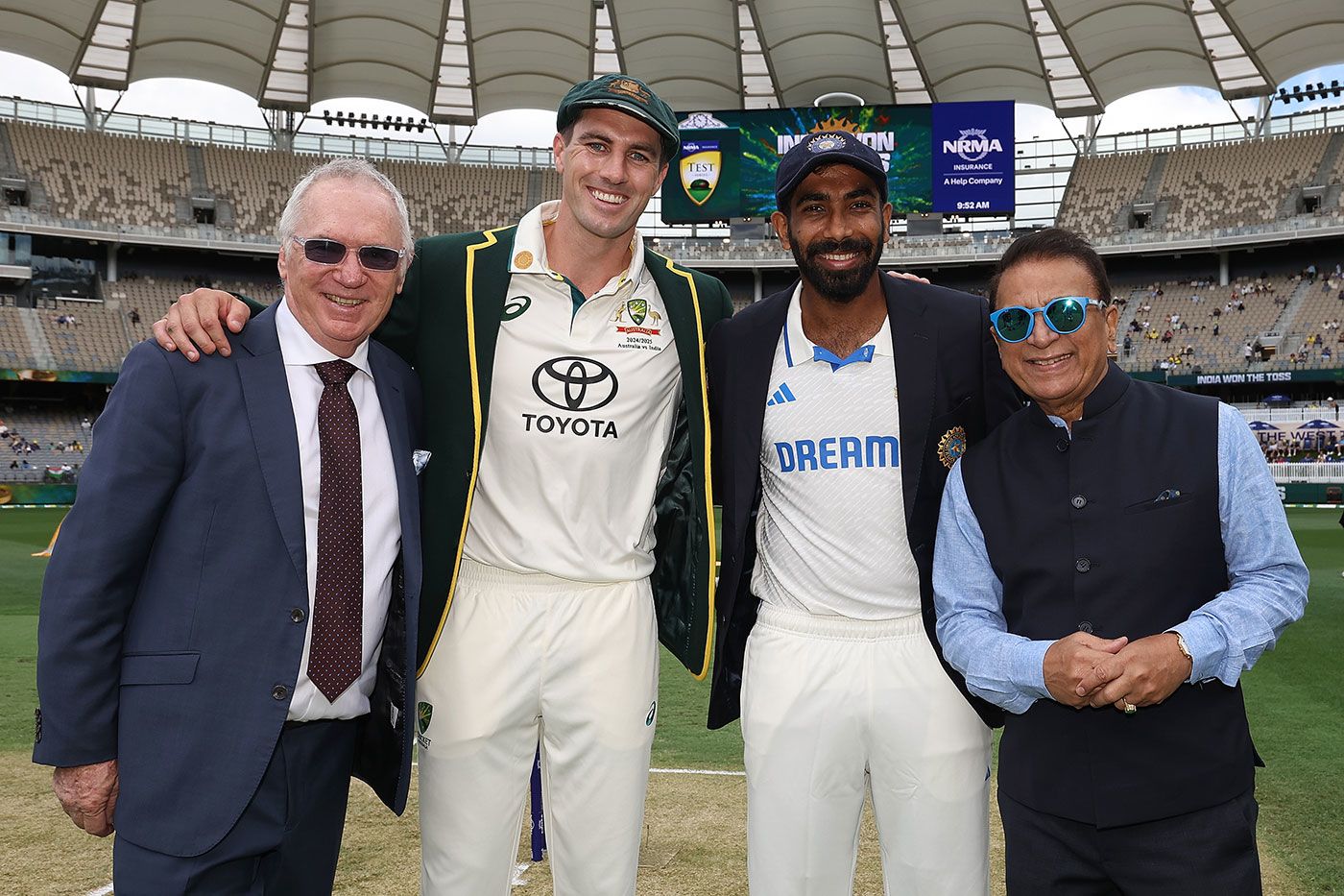 Pat Cummins and Jasprit Bumrah flanked by Allan Border and Sunil Gavaskar