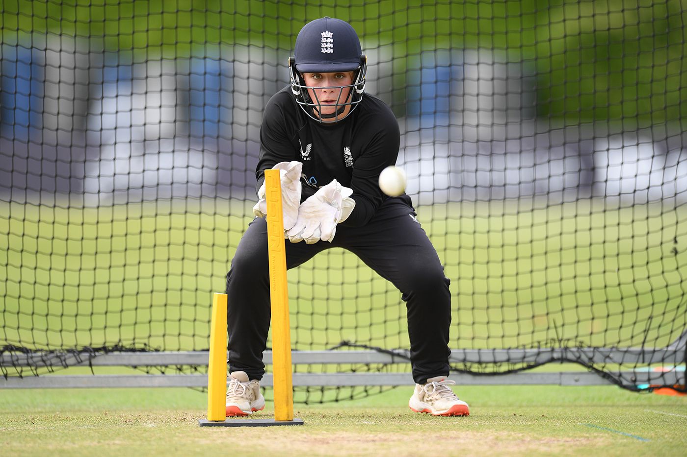 Seren Smale practises her wicketkeeping in training
