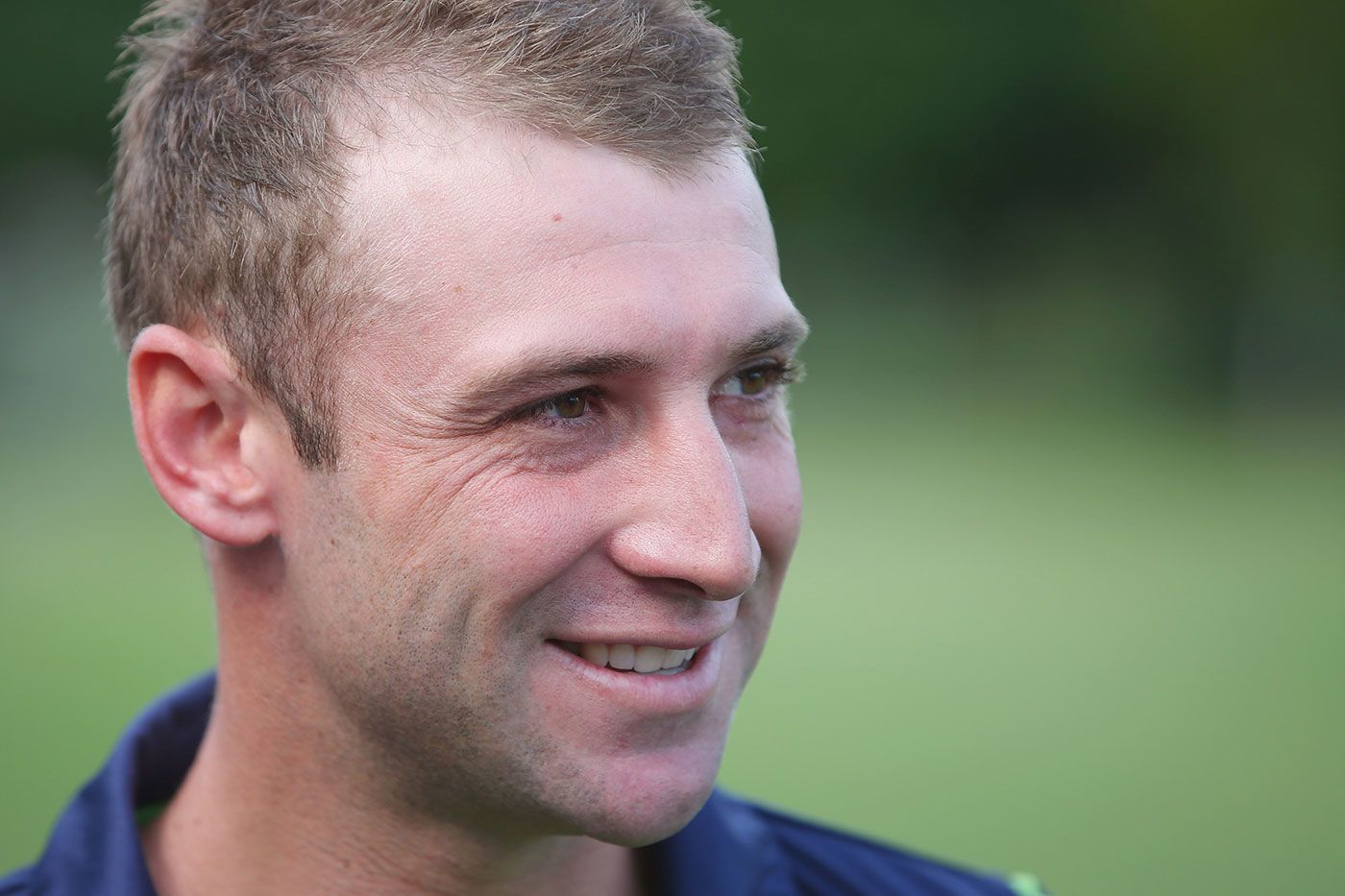 Phillip Hughes looks on