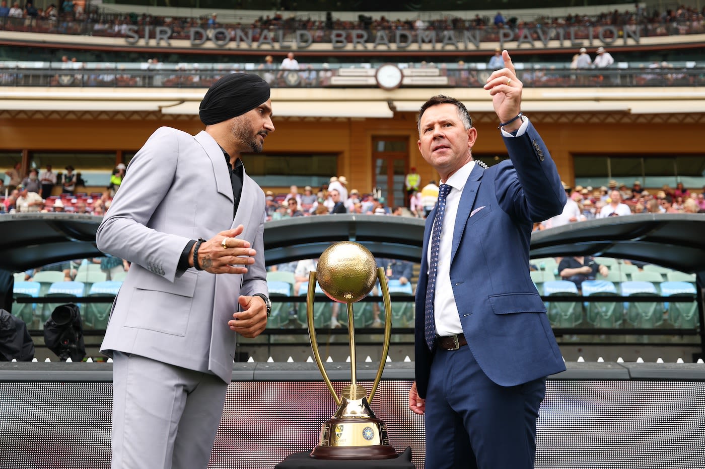 Harbhajan Singh and Ricky Ponting brought the trophy out