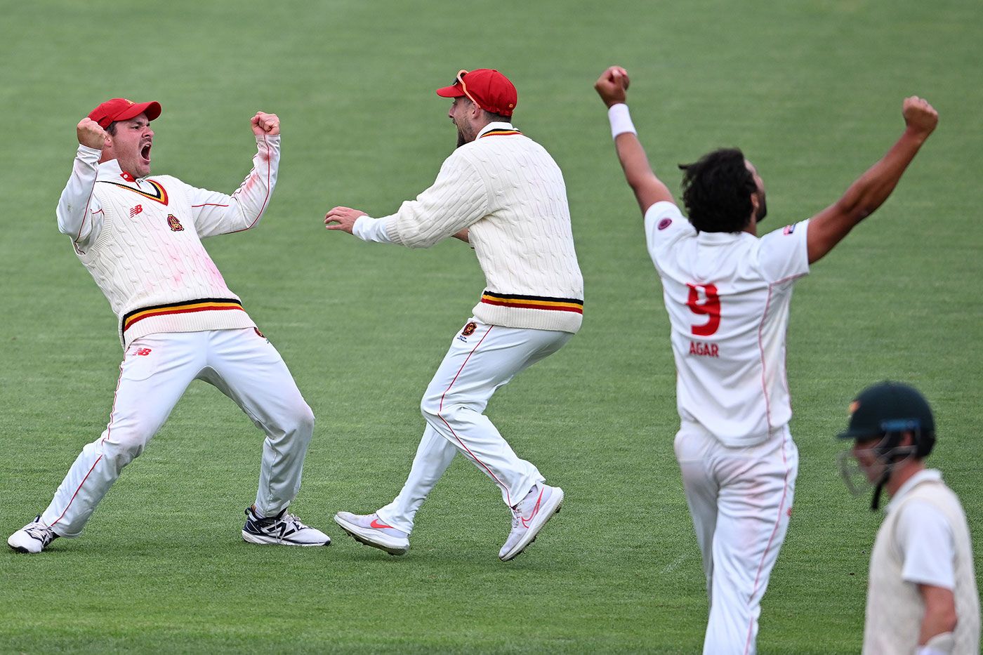 Wes Agar (right) and South Australia team-mates at the moment of victory