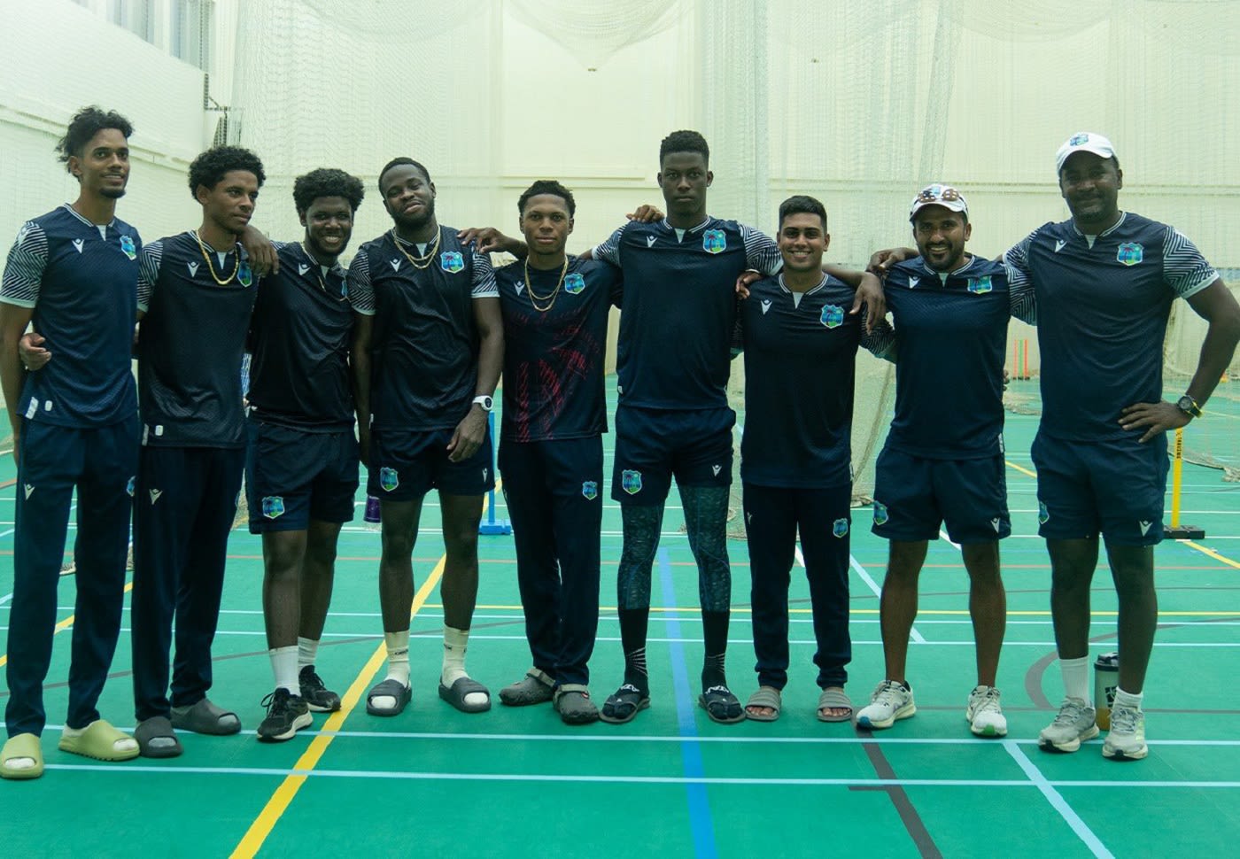 Ackeem Auguste, Teddy Bishop, Jordan Johnson, Kirk McKenzie, Jewel Andrew, Kevin Wickham and Matthew Nandu with coaches Ramesh Subasinghe and Rohan Nurse at the Super Kings Academy