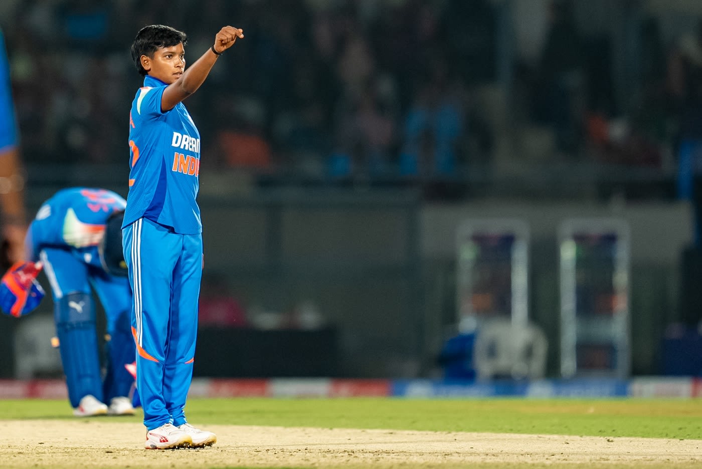 Priya Mishra with a unique celebration after taking her first wicket