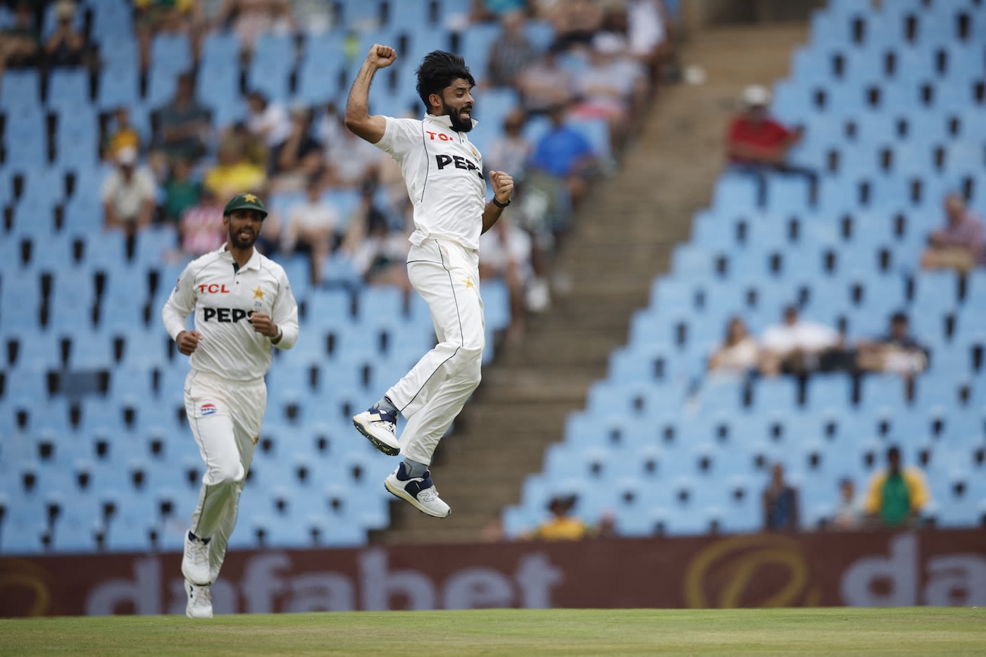 Aamer Jamal leaps in celebration