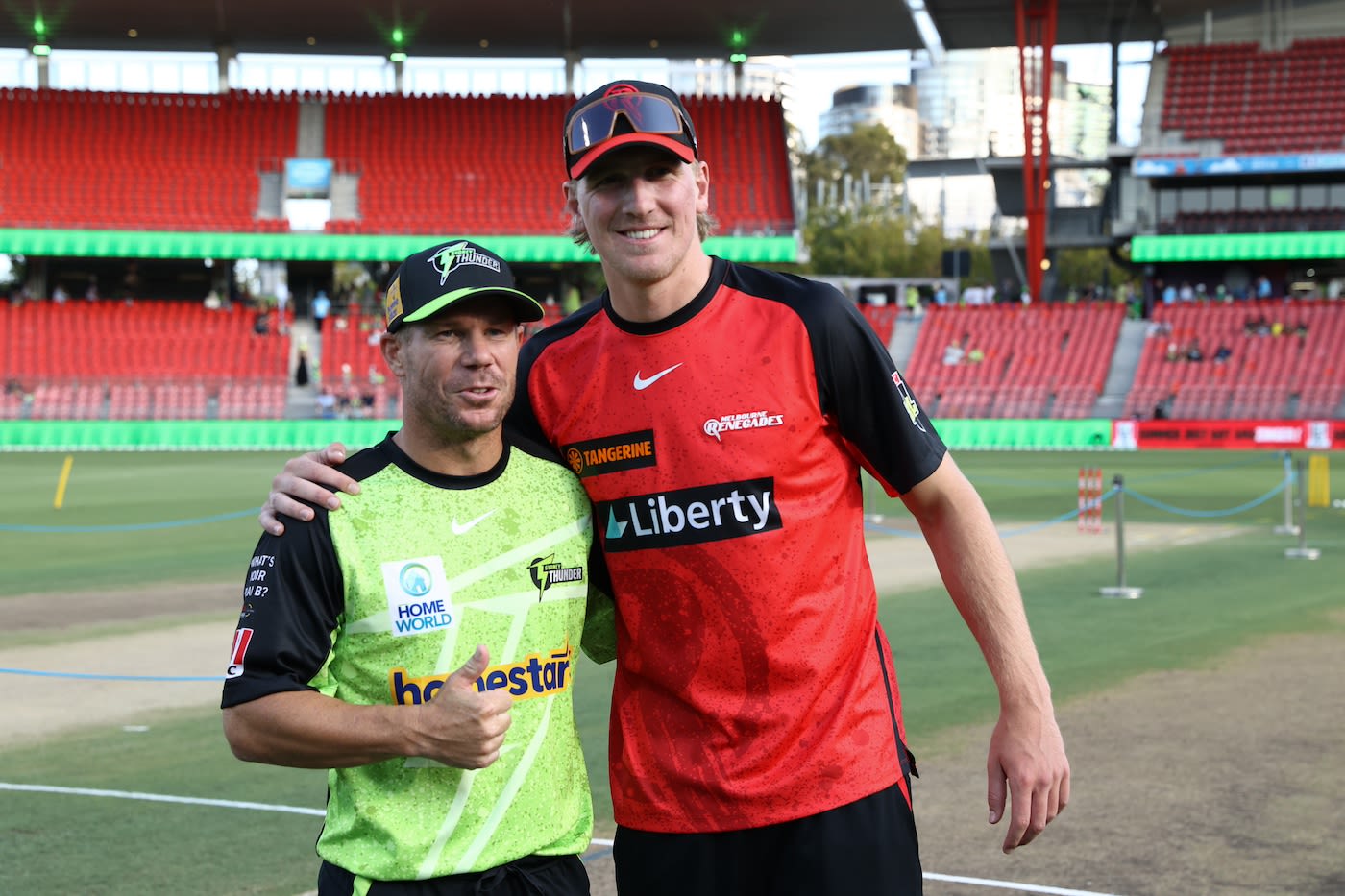 David Warner and Will Sutherland at the toss