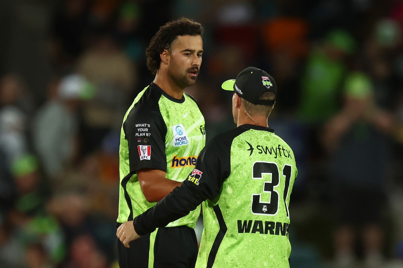 Wes Agar and David Warner get together after the win