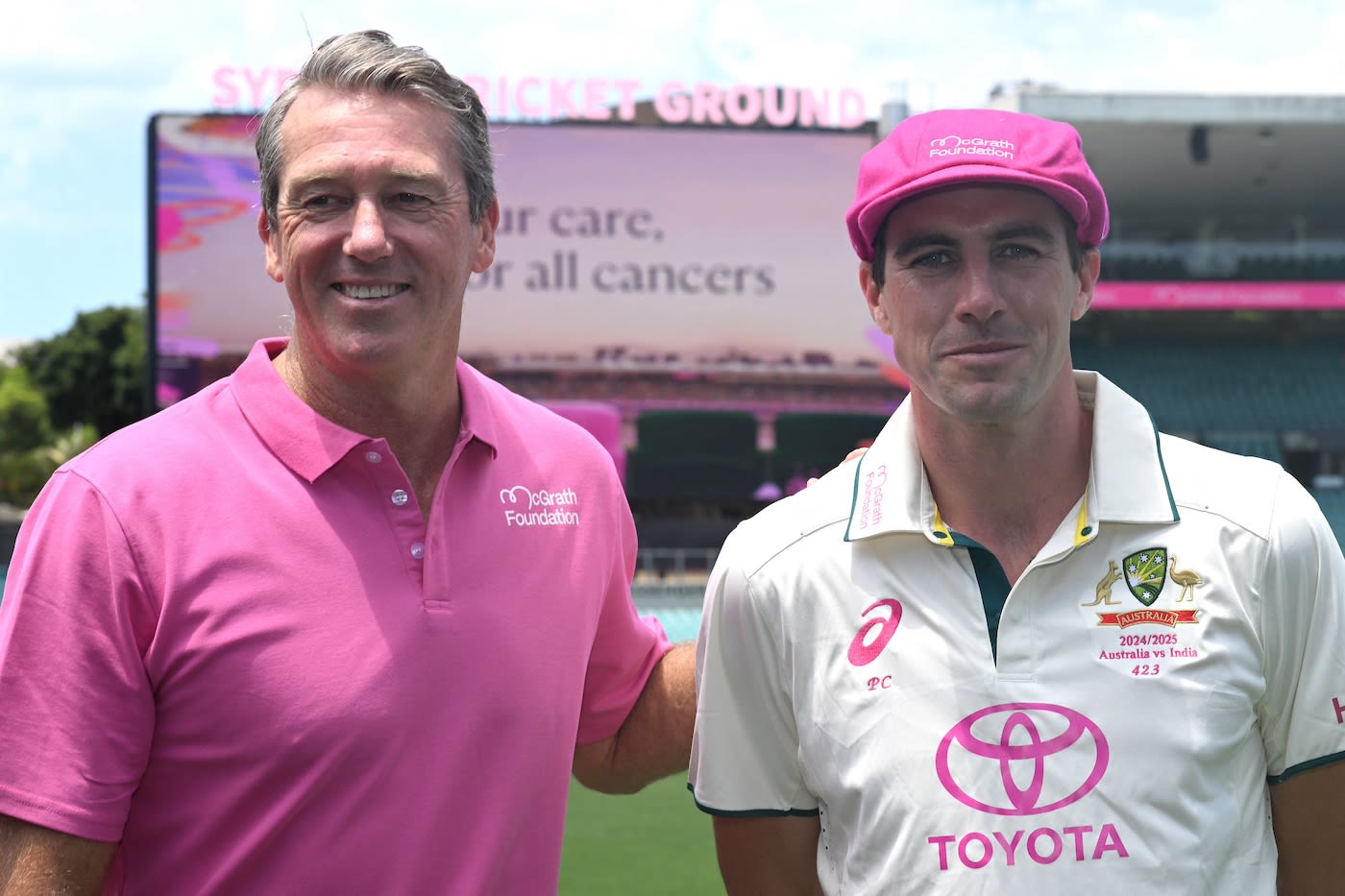 Glenn McGrath and Pat Cummins wear their fundraiser colours