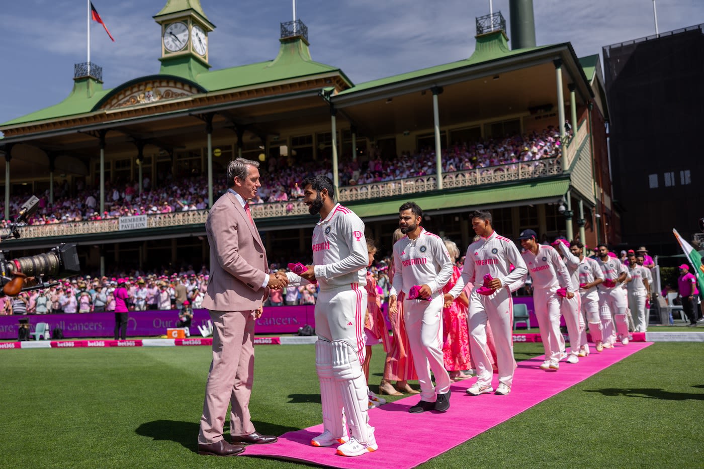 Glenn McGrath greets Jasprit Bumrah during the cap exchange ceremony