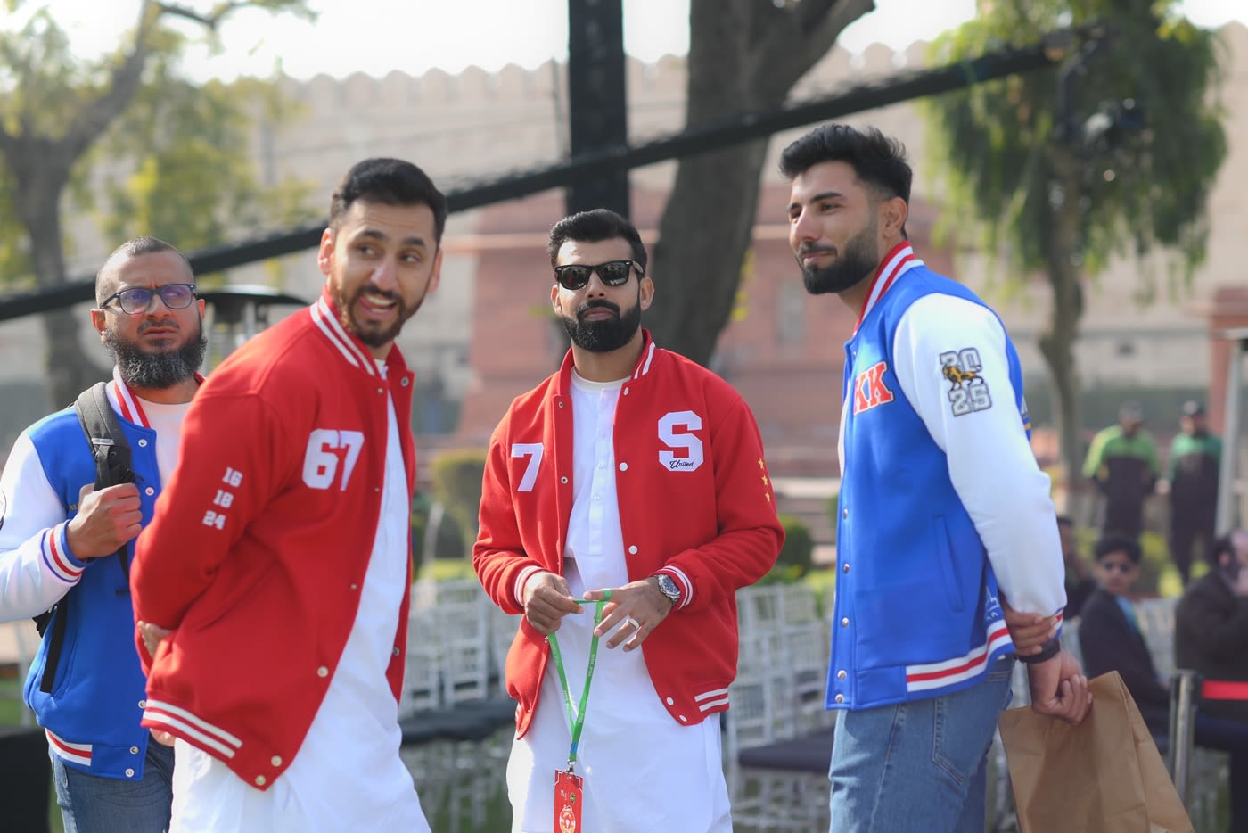 Salman Agha, Shadab Khan and Irfan Khan chat on the sidelines of the PSL draft