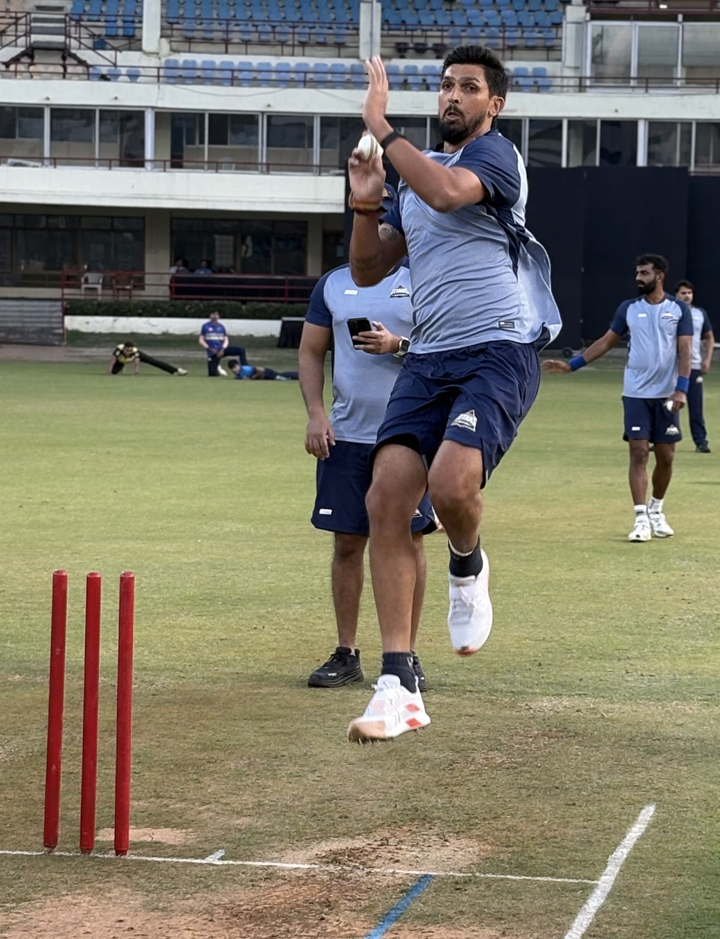 Ishant Sharma bowls during a Gujarat Titans training session
