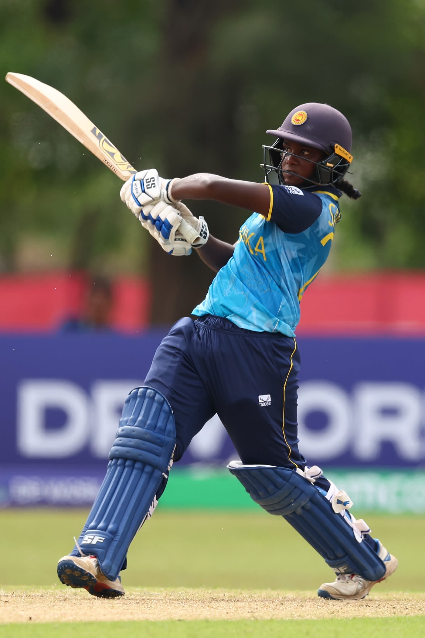 Sanjana Kavindi powers the ball away