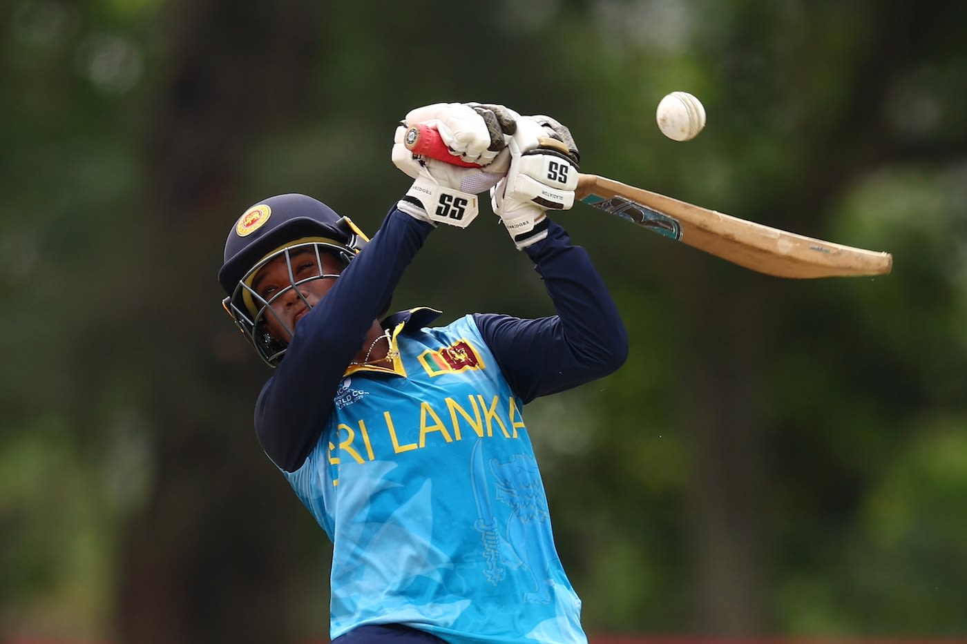 Manudi Nanayakkara attempts to ramp the ball