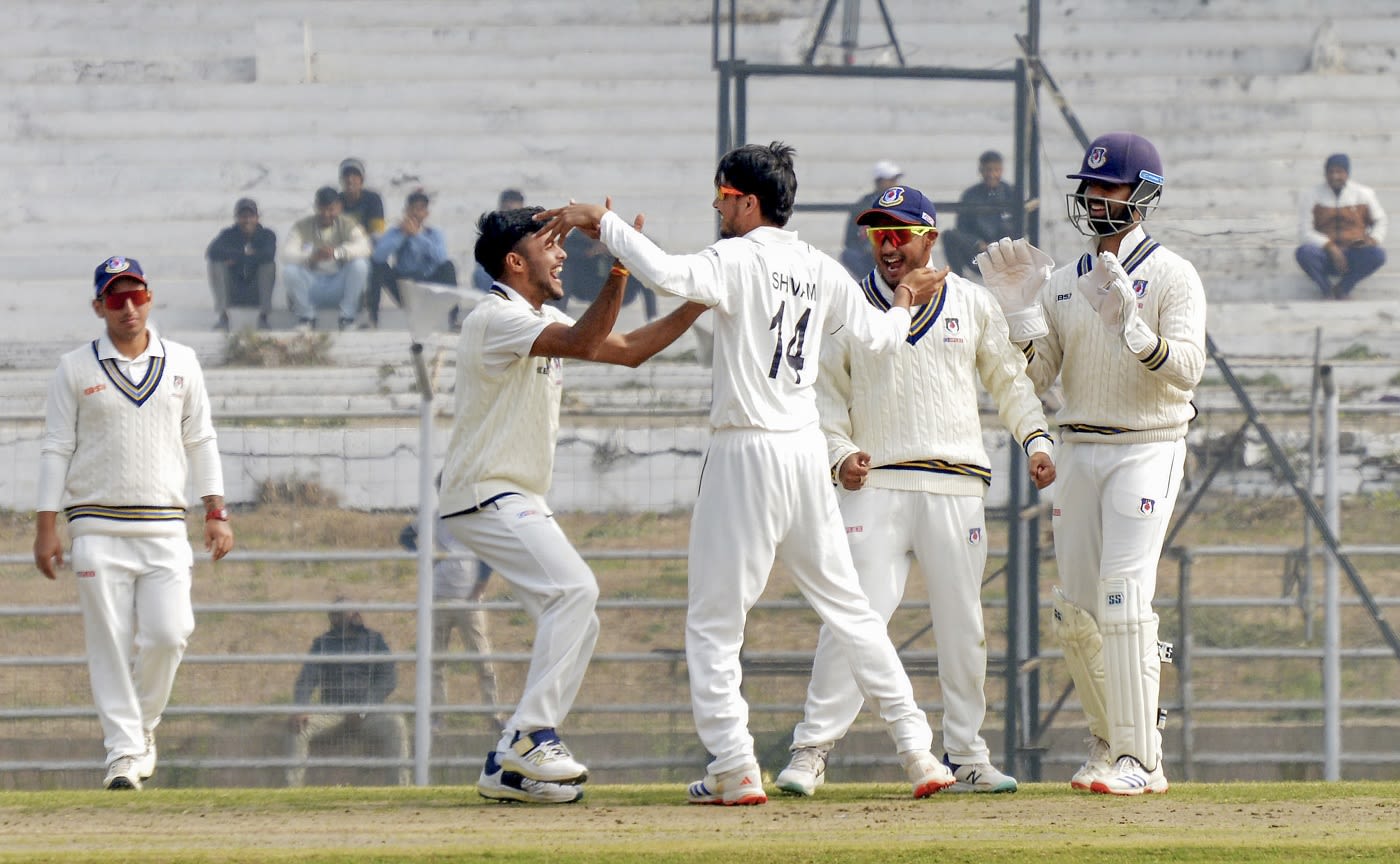 Shivam Sharma celebrates with his team-mates