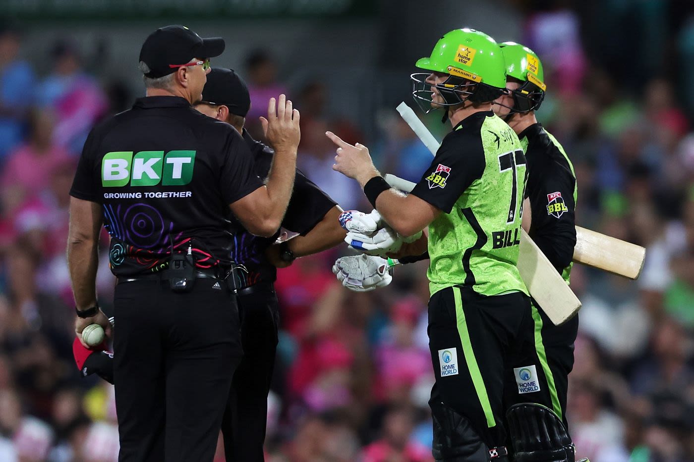 Matthew Gilkes and Sam Billings query a run out decision