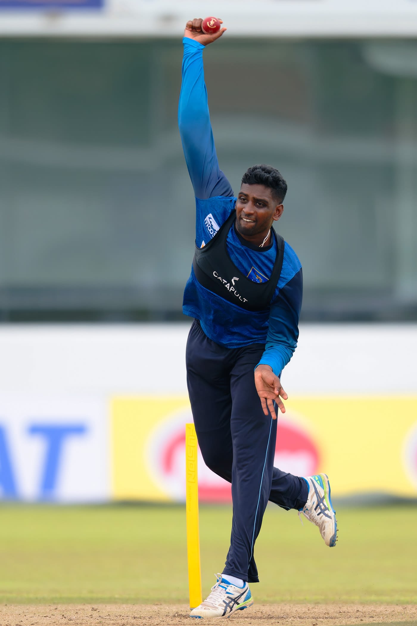 Nishan Peiris has a bowl