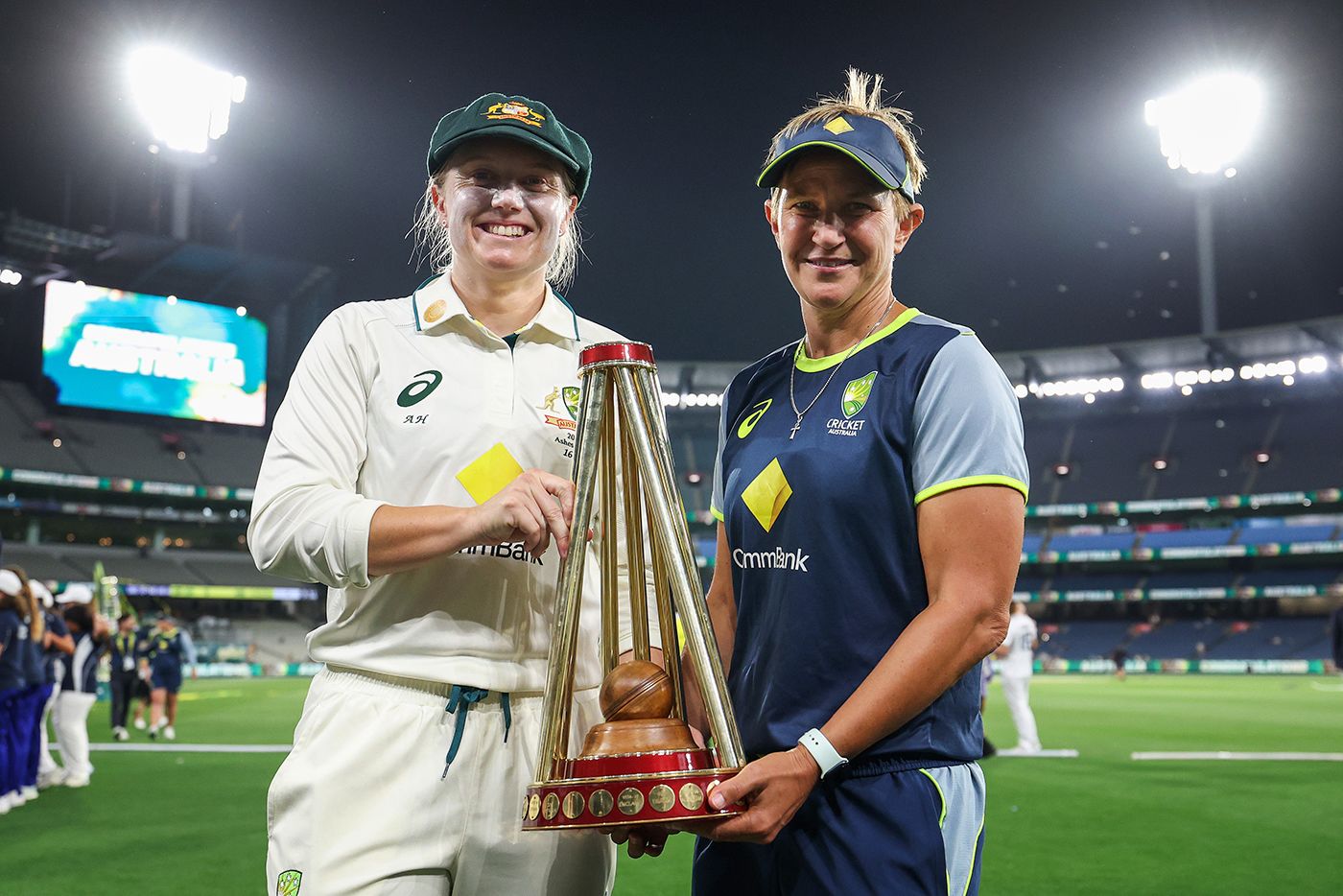 Alyssa Healy and Shelley Nitschke with the Ashes trophy
