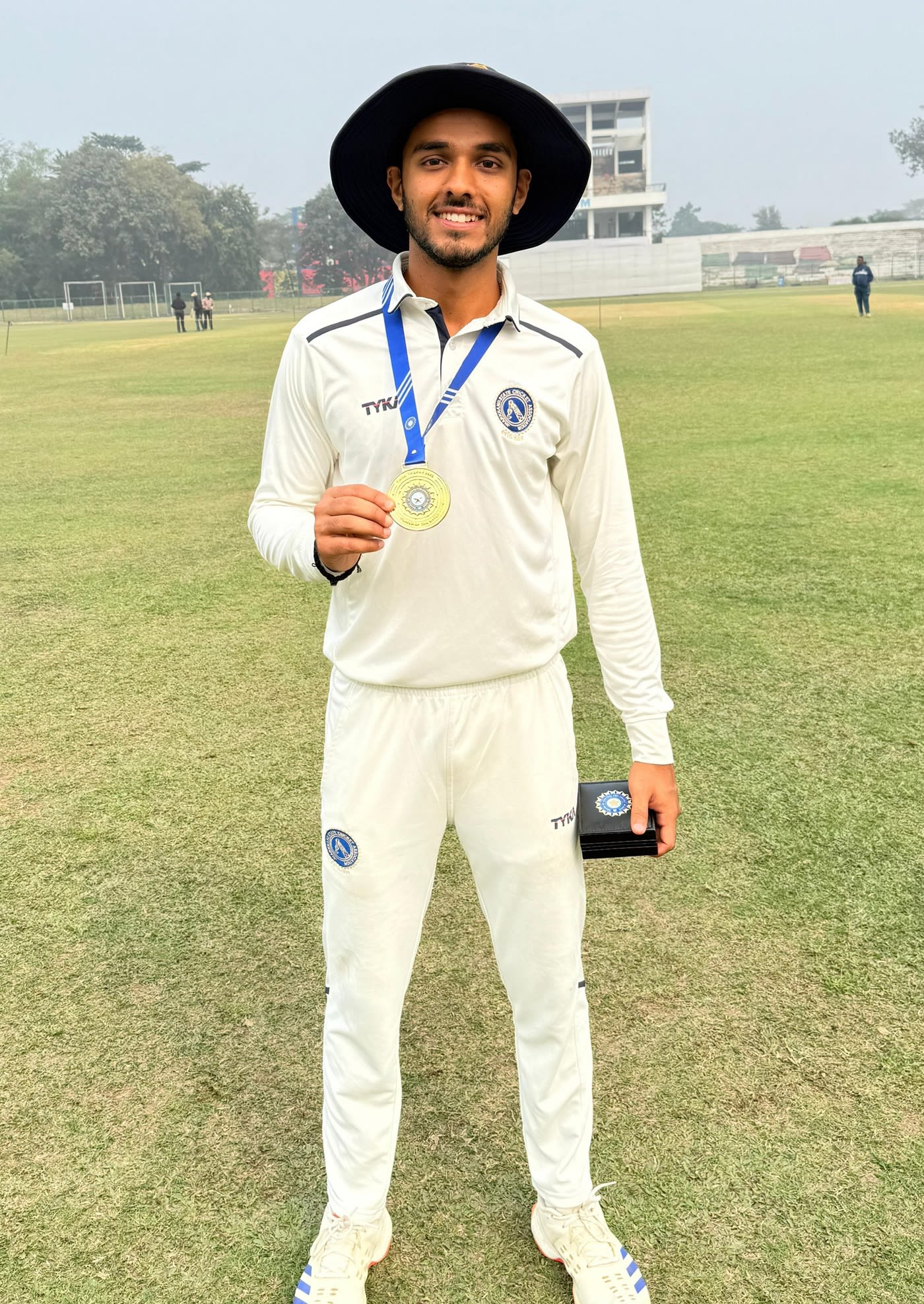 Jharkhand's Utkarsh Singh poses with his Player-of-the-Match medal