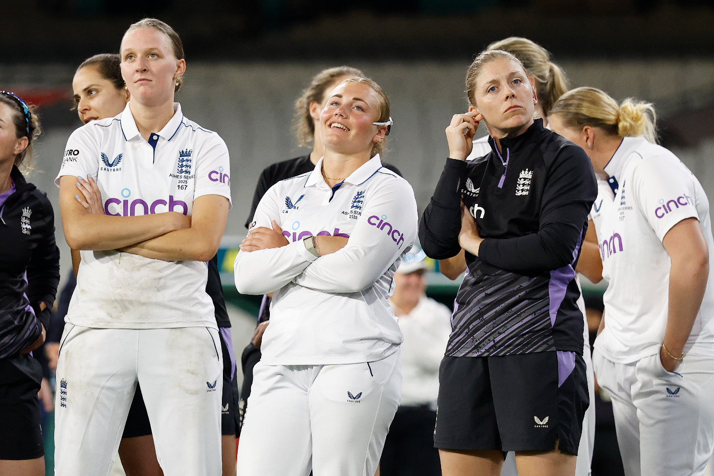 England's players look on as Australia celebrate their Women's Ashes whitewash