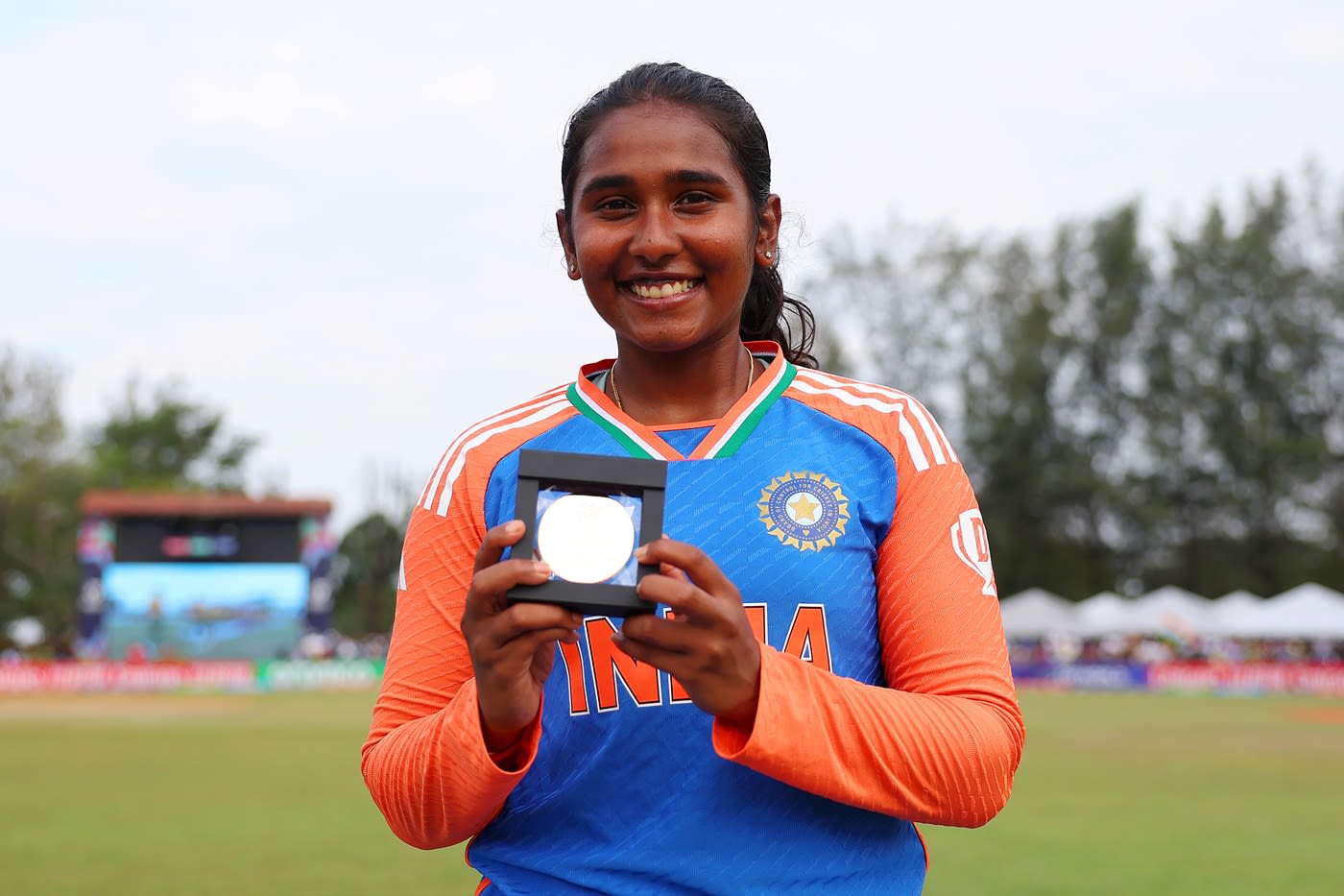 G Trisha poses with her medal after taking India to the Under-19 World Cup glory