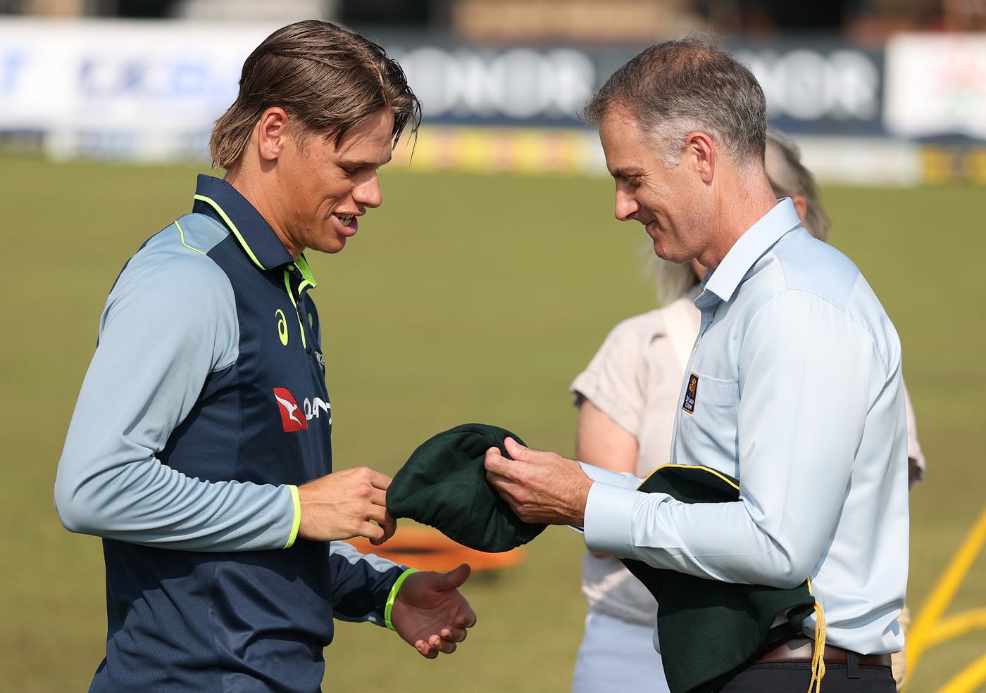 Cooper Connolly receives his debut cap from Simon Katich