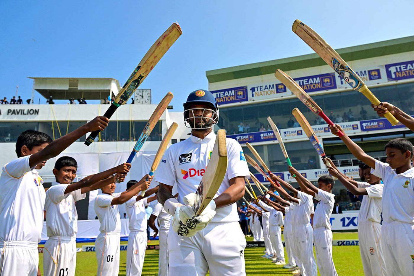 Dimuth Karunaratne walked out through a guard of honour