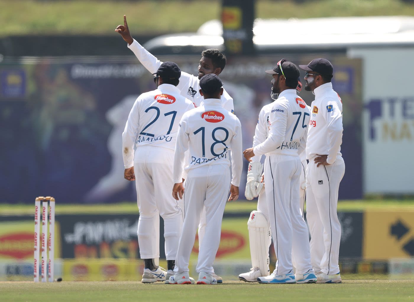 Nishan Peiris celebrates a wicket