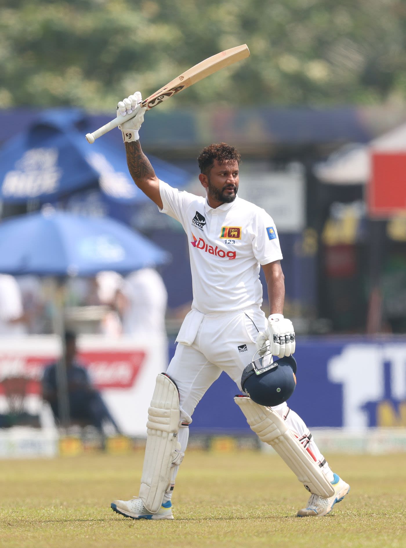 Dimuth Karunaratne walks off a Test arena for the final time