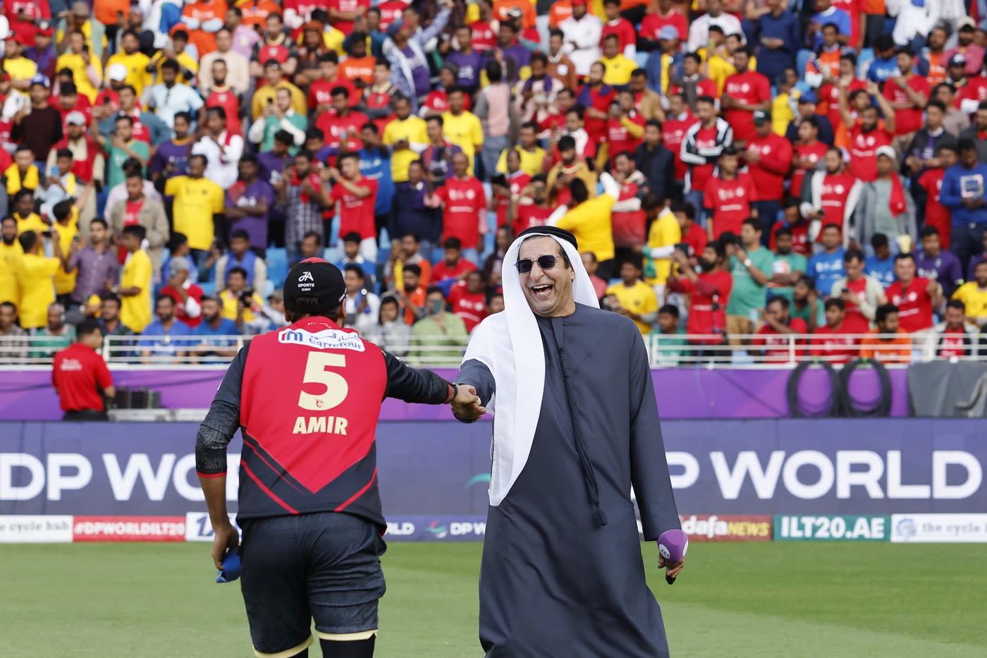 Wasim Akram shares a laugh with Mohammad Amir