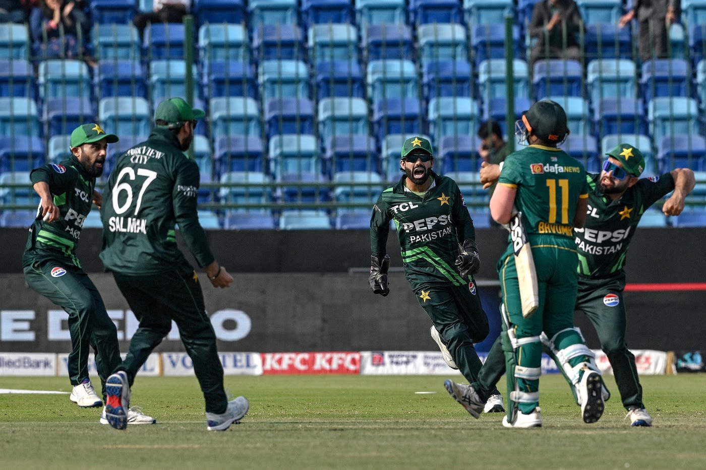 Saud Shakeel, Salman Agha, Mohammad Rizwan and Kamran Ghulam celebrate wildly after Temba Bavuma is run out