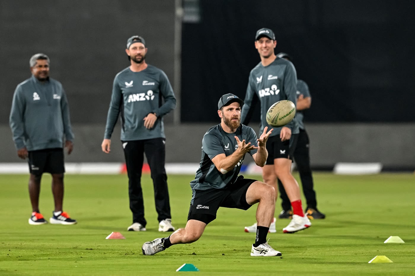 Rangana Herath, Devon Conway, Kane Williamson and Matt Henry at a training session