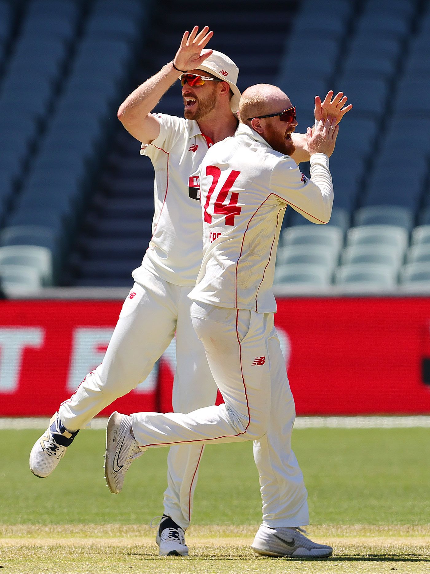 Lloyd Pope celebrates one of his four wickets